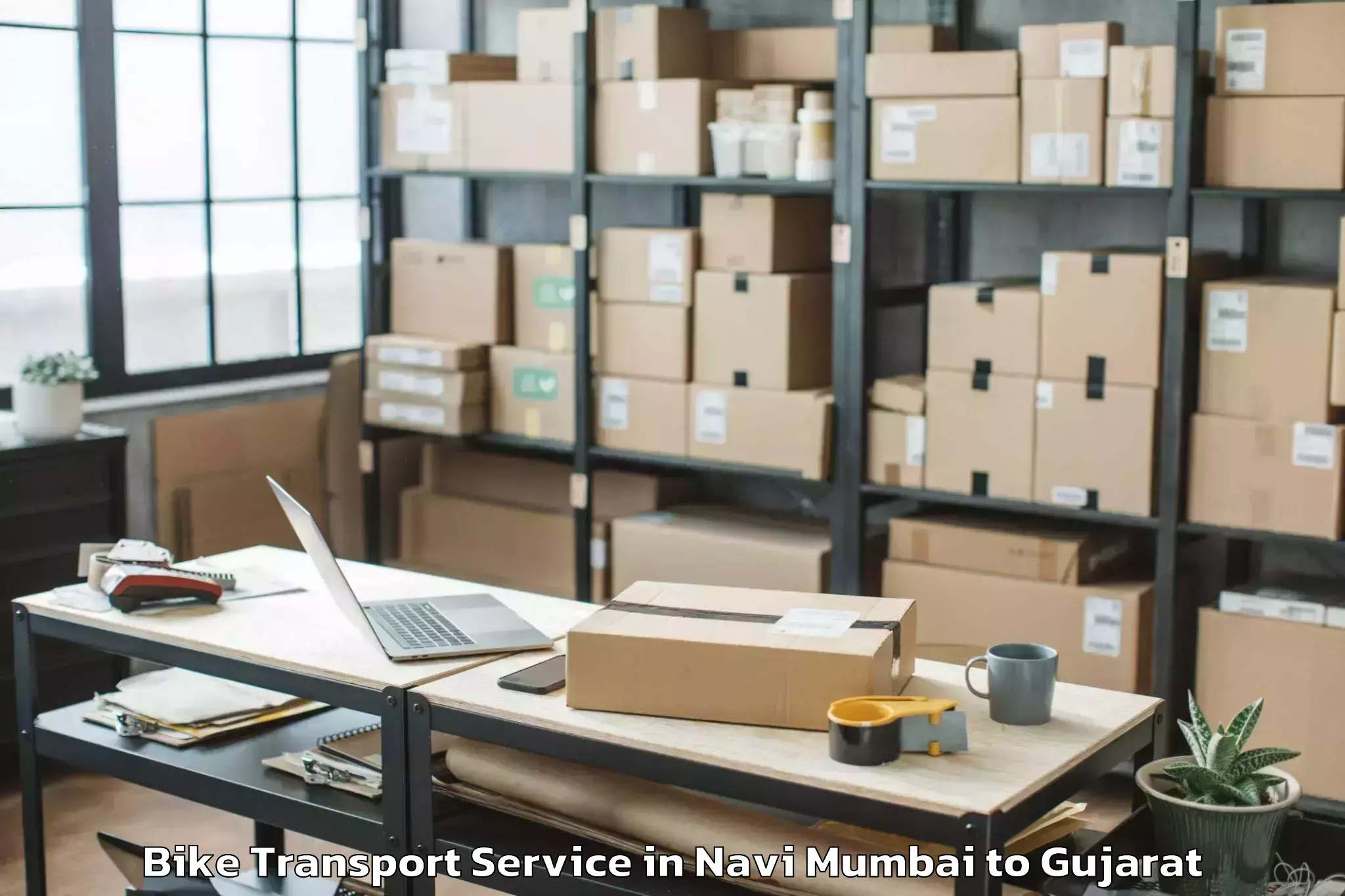 Top Navi Mumbai to Marwadi University Rajkot Bike Transport Available